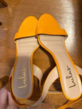 Lulu's orange Open-Toe Slide heels